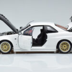 Nissan Skyline GT-R R34 Nismo Z-Tune White MotorHelix 1:18 - image 4 of 11
