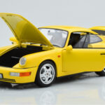 Porsche 911 964 Carrera 2 Yellow Norev 1:18 - image 2 of 8